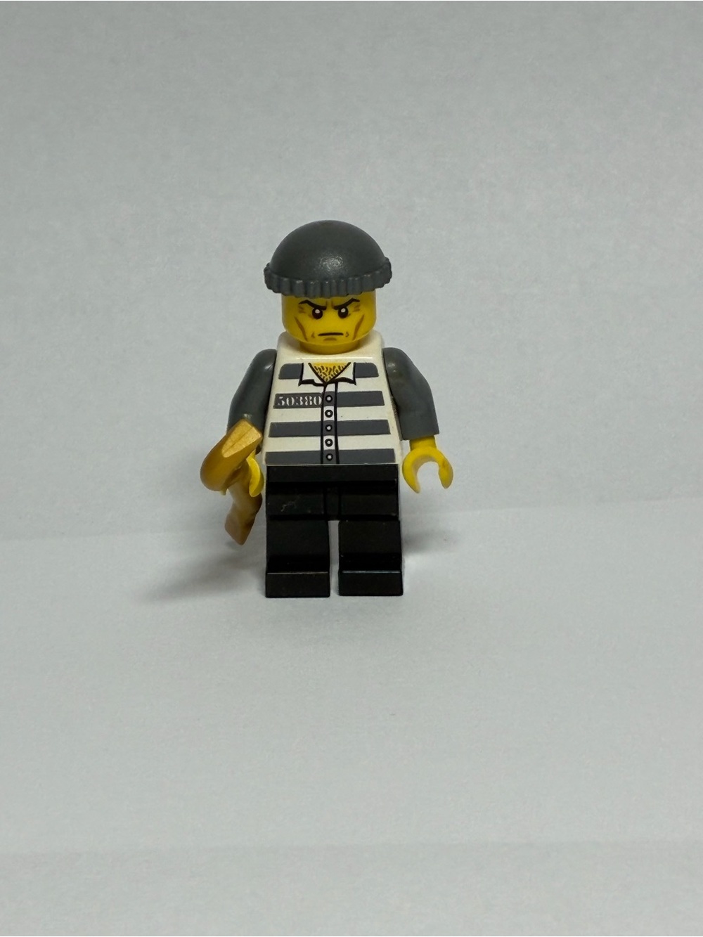 Prisoner Stripe Minifigure with Black Beanie and Gold Accessory